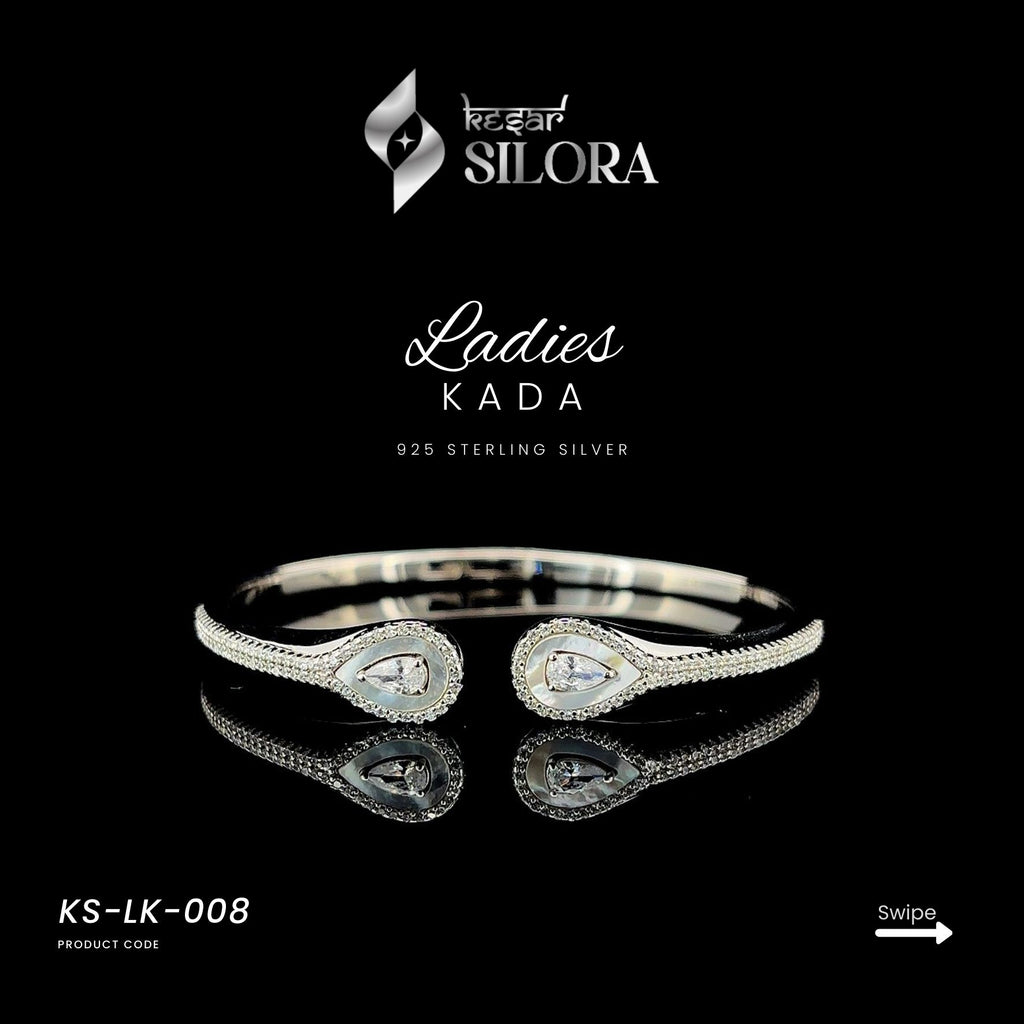 Sterling silver cuff bracelet with teardrop diamonds