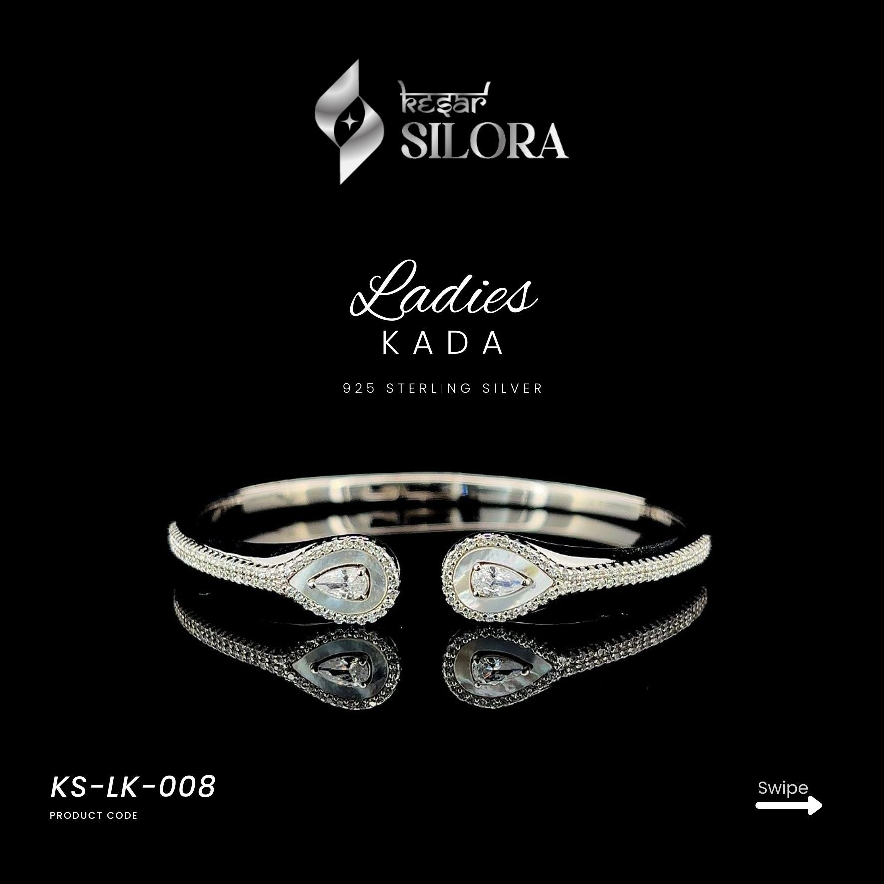 Sterling silver cuff bracelet with teardrop diamonds