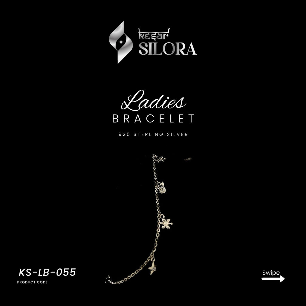 Sterling Silver Bracelet With Multiple Charms