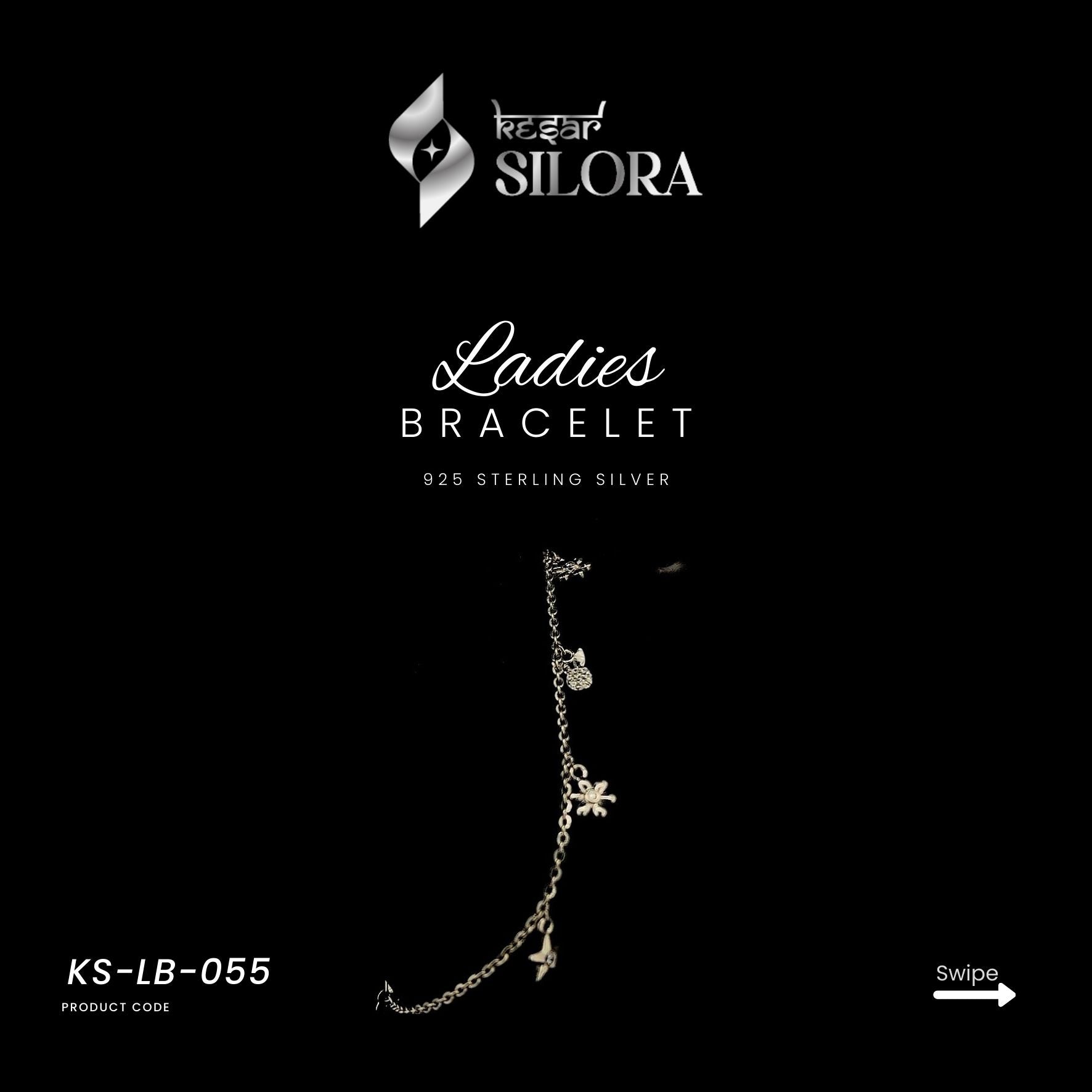 Sterling Silver Bracelet With Multiple Charms